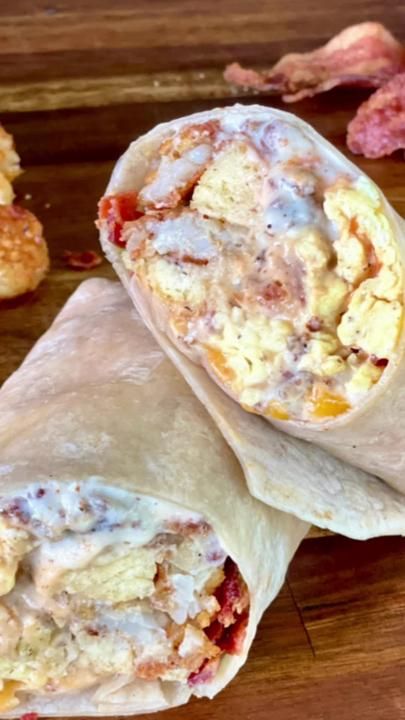 The BEST Biscuits and Gravy Loaded Burrito on the @webergrills new 28i... | TikTok Breakfast Burrito With Gravy, Loaded Biscuits And Gravy, Biscuits And Gravy Breakfast Burrito, Biscuits And Gravy Burrito, Loaded Burrito, Best Biscuits And Gravy, Best Biscuits, Sausage Gravy And Biscuits, Cafe Recipes