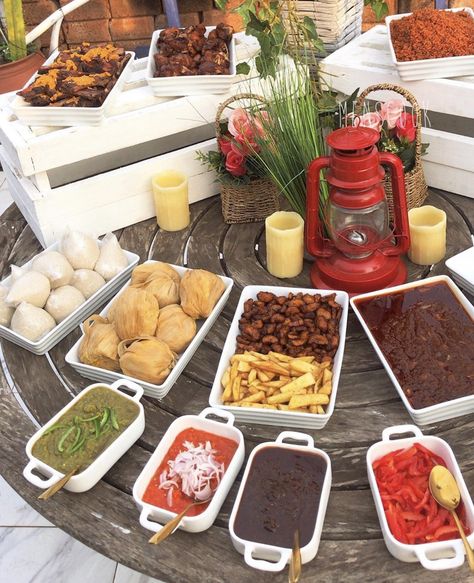 Ghanaian dishes buffet with Ghana jollof, fried plantain/kelewere, fried yams, kenkey, and banku. Ghana Jollof, Ghanaian Dishes, Finger Food Catering, Fried Plantain, Ghana Food, Ghanaian Food, West African Food, Africa Food, Party Food Buffet