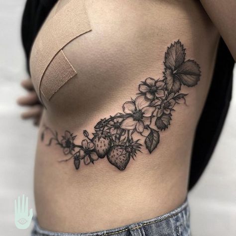 Hamsa Tattoo on Instagram: "How incredible is this strawberry piece!? Made by @bobbiedazzlertattoo who pieced this together on the body to make sure this fit absolutely perfectly!" Under Belly Tattoo Woman, Plants Around Knee Tattoo, Skull Strawberry Tattoo, Strawberry Spine Tattoo, Strawberry Mushroom Tattoo, Strawberry Skull Tattoo, Strawberry Hip Tattoo, Canning Tattoo, Strawberry Bush Tattoo