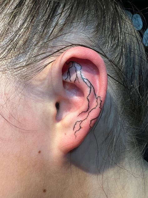 New tat Inside Ear Tattoos, Star Tattoos Behind Ear, Behind Ear Tats, Inner Ear Tattoo, Lightning Bolt Tattoo, Lightning Tattoo, Bolt Tattoo, Ganesha Tattoo, Flame Tattoos