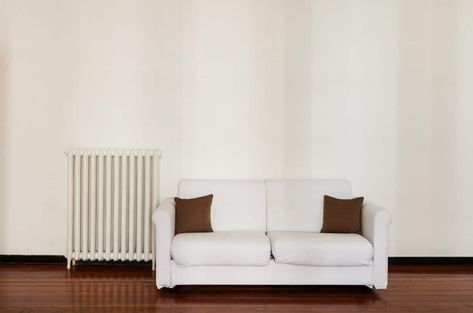 Radiators Living Room, Steam Radiators, Best Radiators, Home Radiators, Small Floor Plans, Vertical Radiators, Brown Cushions, Design Hack, Stylish Sofa