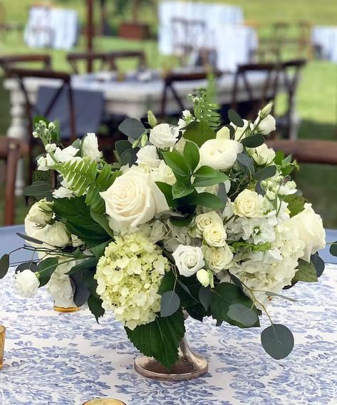 Table Centerpiece in Pedestal container featuring white seasonal flowers by Carithers Flowers Atlanta Flower Arrangements For Rehearsal Dinner, White Peony Wedding Flowers, Gardenia Floral Arrangement, Classic Elegant Wedding Centerpiece, White Arrangements Flowers, All White Floral Centerpieces, White And Gold Centerpieces, Round Table Arrangements, Green And White Flower Arrangements