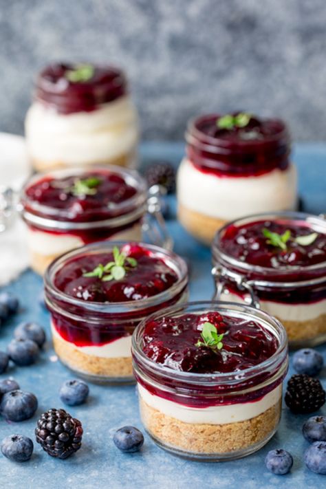 Individual Berry No Bake Cheesecakes - My Recipe Magic #desserts #dessertfoodrecipes #sweets January Desserts, Cheesecake Designs, Cherry Cheesecake Dessert Cups, Cheesecake Recipes Berry, No Bake Cheesecake Mason Jar, Magic Desserts, Bolo Aesthetic, Mini Cheesecake Recipes No Bake Mason Jars, Mixed Berry No Bake Cheesecake