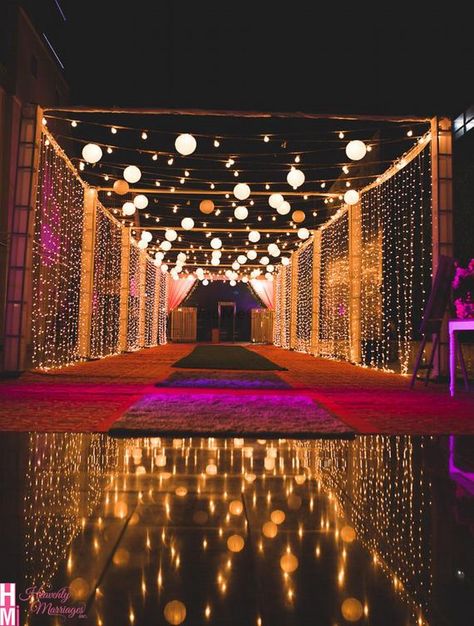 Wedding Entrance Light Decor, Mandap Decor With Lights, Outdoor Wedding Stages, Wedding Sangit Decoration, Wedding Night Ideas Decoration, Backyard Sangeet, Marriage House Decoration, Outdoor Sangeet Decor Night, Sangeet Decoration Stage Outdoor