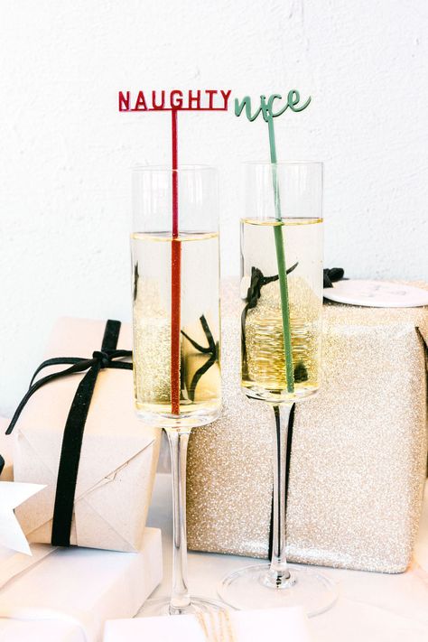 Naughty or Nice? Claim your cup with a cute little Christmas drink stirrer! Perfect for Christmas parties, intimate events, and the holidays, these unique drink tags make the most adorable embellishment to your cocktails. Simply pop them into a champagne flute or wine glass and use them as place cards or party favors for your guests!Set of 12 // 2 stirrers per designMeasurements: Approximately 2-2.5" W x 6.5" H Material: AcrylicSafe to use in hot and cold beveragesCare instructions:Kindly hand w Simple Christmas Party Decor, Christmas Drink Stirrers, Christmas Bachelorette Party, Christmas Engagement Party, Intimate Events, Christmas Theme Party, Classy Christmas Party, Elegant Christmas Party, Christmas Bridal Showers