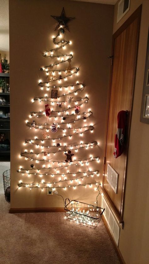 75 Simple Dollar Tree Christmas Decoration Ideas that are scintillating and lively - Hike n Dip Christmas Tree Made With Lights, Wall Christmas Tree Lights, Light Christmas Tree On Wall, Light Tree On Wall, Christmas Light Tree On Wall, Christmas Tree Lights On Wall, Christmas Tree Out Of Lights, Christmas Light Wall, Christmas Lights Wall