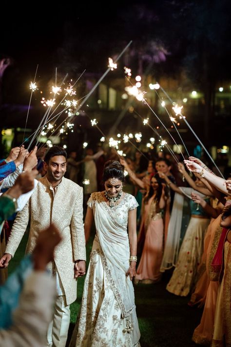 Bride and groom reception entry idea with sparklers