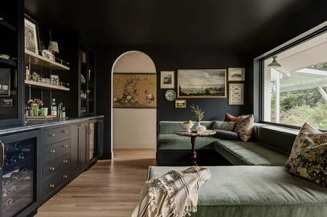 6 Ways to Make Your Living Room Look Expensive, According to Designers Small Moody Living Room, Long Banquette, Moody Maximalist Decor, Black Living Rooms, Black Living Room Ideas, Den Inspiration, Moody Living Room, Corner Nook, Built In Banquette