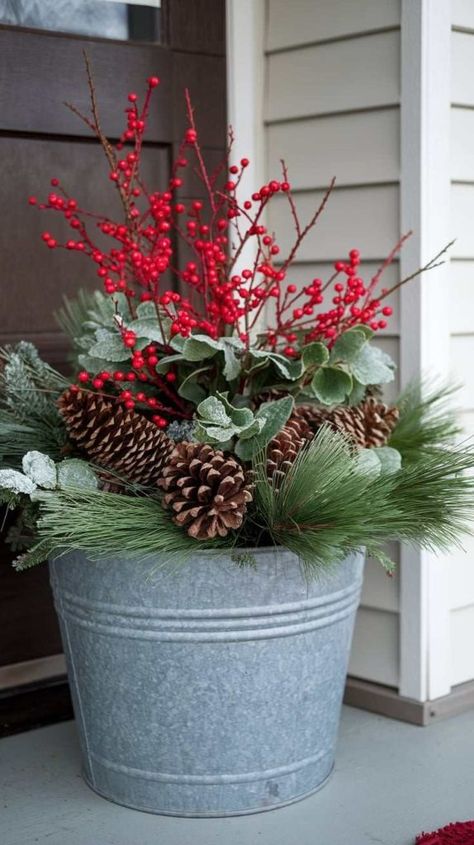 29 Winter Planter Ideas You’ll Want to Steal for a Gorgeous Garden Makeover! 7 Winter Outside Pot Ideas, Outdoor Winter Pots Decorating Ideas, Spruce Pot Ideas, Outdoor Winter Arrangements, Winter Planter Ideas Flower Pots Outdoor Christmas, Front Porch Planter Ideas Entrance, Winter Flower Pots Outdoor, Outdoor Winter Planter Ideas, Outdoor Winter Pots