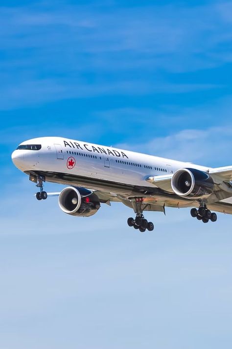 Image of an Air Canada plane flying Canadian Airlines, Flying Flag, Book Flights, Air Canada, New Photo Download, Jet Plane, Booking Flights, Boeing 747, Air Travel