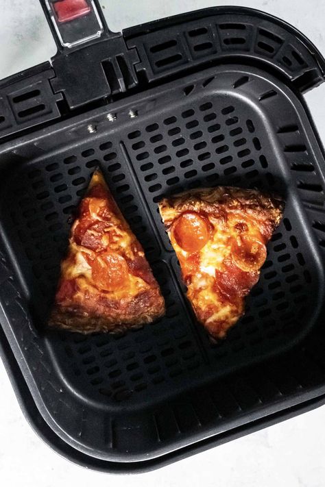 How to reheat pizza in an air fryer. Air frying is the best way to reheat pizza to get a delicious crispy crust and hot, melty cheese. It's so easy, and faster than the oven! Learn how long to reheat pizza in the air fryer, plus tips for success. Reheat Pizza In Air Fryer, How To Reheat Pizza, Pizza In Air Fryer, Pizza Side Dishes, Reheat Pizza, Crispy Pizza, Leftover Pizza, Piece Of Pizza, Meals Easy