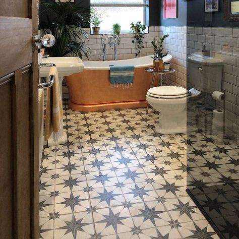 Annie brought her bathroom space back to life by creating a striking statement floor. She... Metro Tiles Bathroom, Rustic Cabin Bathroom, Patterned Bathroom, Her Bathroom, Star Tile, Bathroom Transformation, Cabin Bathrooms, Art Deco Bathroom, Tile Trends