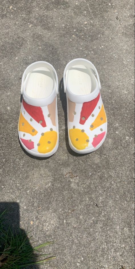 Sunshine painted Crocs Crocs Customize Paint, Painted Crocs Shoes Diy, Painting On Crocs, Diy Crocs Shoes Paint, Custom Painted Crocs, Painted Crocs Ideas, Painting Crocs Shoes Diy, Drawing On Crocs, Custom Crocs Shoes Paint