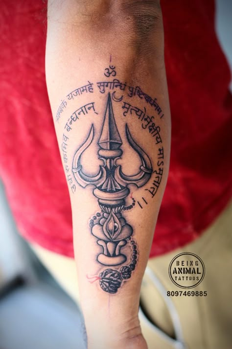 Another great Trishul created by Being animal tattoos team, where our earlier Trishul got demand from all over India, our client ask for the Same but we have given him the new one. Third eye, moon, mahamrityunjaya mantra, Rudraksh and trishul. 8097469885 Mahamrityunjaya Mantra Tattoo, Full Arm Tattoo Men, Mahakal Tattoo, Tattoo Trishul, Christmas Rangoli, Om Trishul Tattoo, Hand Tattoos For Guys Men, Arm Tattoo Men, Religion Tattoos