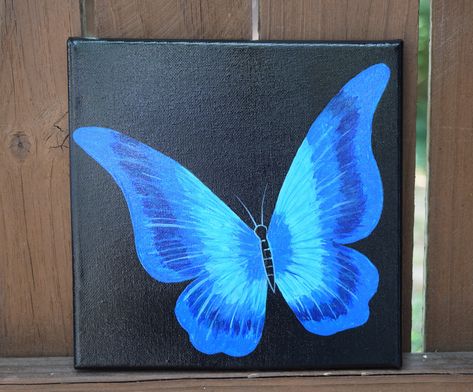 Beautiful Blue Butterfly Painting on 8x8 Canvas Painting Ideas Butterfly, Blue Butterfly Painting, Purple Painting, Black Canvas Paintings, Butterfly Art Painting, Small Canvas Paintings, Canvas Painting Ideas, Hippie Painting, Butterfly Canvas