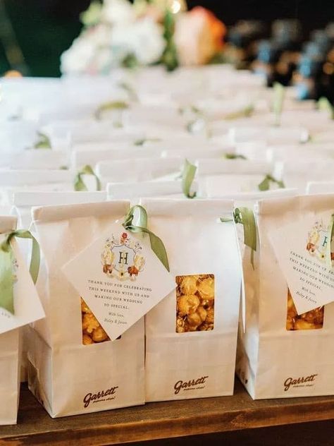 15 Cute Wedding Popcorn Bar Ideas + How To Set Them Up Wedding To Go Snacks, Wedding Favors Snacks, Wedding Favor Popcorn, Popcorn Gift Bags Party Favors, About To Pop Popcorn Favors, Popcorn Wedding Favors For Guests, Wedding Popcorn Bar Ideas, Baby Shower Popcorn Favors, Wedding Favor Snacks