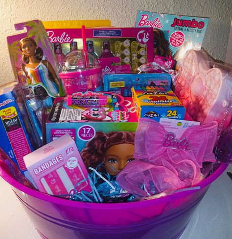 The perfect creation basket for a Barbie girl. Fabulous gift for a young lady age 4 to 12 years old. Great for a birthday gift, Christmas gift, or a special present. This gift basket has a little bit of everything for a little girl and something that will put a huge smile on their faces.  Includes: 23 items  Barbie Styling Head with 17 Accessories      Barbie Design Activity Convertible  Barbie Doll                                                          Luv Her Barbie Headband 4pc  Barbie Activity Set                                            Barbie Tumbler Cup Barbie Coloring Book                                       Large Pop Fidget Purse Barbie Fruit Snacks                                           Pink Heart Sunglasses  Barbie Toothbrushes                                        Bar Barbie Theme Gift Basket, Barbie Gift Basket, Barbie Easter Basket, Barbie Headband, Barbie Coloring Book, Barbie Tumbler, Barbie Styling Head, Pink Heart Sunglasses, Barbie Design