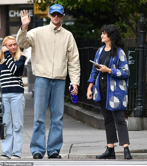 Jacob Elordi lays low in baseball cap and casual outfit in NYC ahead of the release of his new film Priscilla where he takes on iconic Elvis Presley | Daily Mail Online Jacob Elordi Winter Outfit, Blue Cap Outfit Men, Jacob Elordi Long Hair, Cap Casual Outfit, Jacob Elordi Style, Blue Cap Outfit, Jacob Elordi Outfits, Cap Outfit Men, Mens White Suit