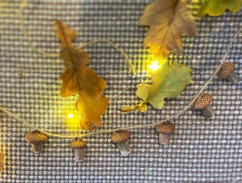 Garland with 6 mushroom ornaments for decorating or as neckless. Made out of organic material, acorn cap tops and branch stems🍄🍁 Each is different in size, usually measure between 2-3cm. #hufflepuffaesthetic #whimsigirl #whimsical #hogwartsaesthetic #whitchcraft #magicjewelry #autumnvibes #autumnaesthetic #hobbitaesthetic #middleearthcosplay #hobbitcosplay #hobbitlife #lotrcosplay #hobbitjewelry #harfoot #mushroomart #mushroomjewelry #whitewhitch #cottagecore #cottageaesthetic #cottagejewelry Mushroom Garland, Hobbit Cosplay, Mushroom Ornaments, Hufflepuff Aesthetic, Mushroom Crafts, Mushroom Jewelry, Cottage Aesthetic, Hogwarts Aesthetic, Cottagecore Decor