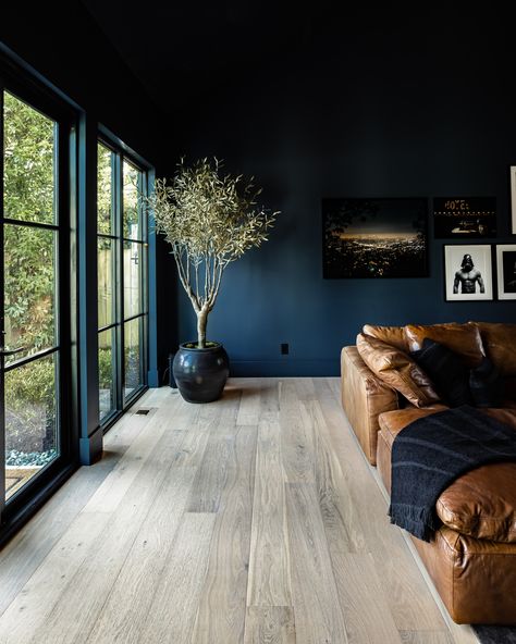 Dark Blue Industrial Living Room, Deep Blue Home Decor, Blue Colors For Living Room Walls, Deep Blue Walls Living Room, Deep Blue Living Room Ideas, Dark Blue Paint Colors For Living Room, Moody Dark Blue Living Room, Dark Blue Decor Living Room, Dark Blue Lounge Room