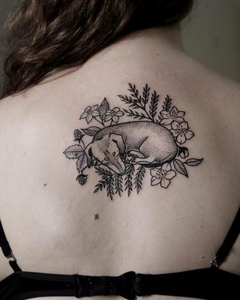 10+ Of The Best Dog Tattoo Ideas Ever Sweet Dog Tattoo, Dog With Halo Tattoo, Whimsical Dog Tattoo, Curled Up Dog Tattoo, Brindle Dog Tattoo, Dog Laying Down Tattoo, Dachshund Memorial Tattoo, Dog Tattoo Flowers, Dog Curled Up Tattoo