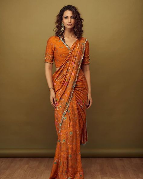 meenakshi chudahry in orange saree by sonam luthria for hit 2 Rust Skirt, Meenakshi Chaudhary, Pre Draped Saree, Skirt Saree, Choli Blouse Design, Draped Saree, Tiered Blouse, Orange Saree, Latest Designer Sarees