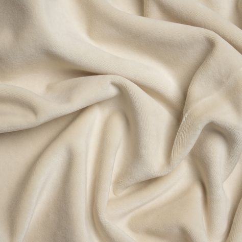 Show off your sunny spaces with this neutral Banton Creme Cotton and Polyester Upholstery Velvet. Luxe interiors begin with velvet, a textile equal in modern sophistication as comfort. The muted cream face brings this cotton and polyester fabric down to earth, displaying a digestible color ideal for blending with other textures, colors, and design styles.  Featuring a soft face, modest luster, and supple drape, you can easily upholster tufted headboards, throw pillows, and armchairs. A velvet co Nude Velvet Fabric, Cream Velvet Texture, Cream Pantone, Soft Fabric Texture, Velvet Fabric Texture, Cream Velvet Fabric, Tufted Headboards, Tufted Upholstered Headboard, Velvet Cream