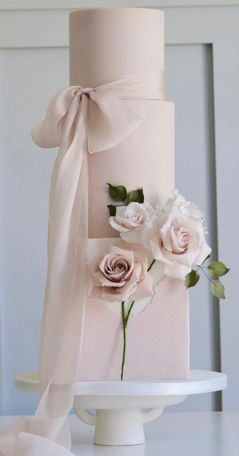 Pink and white three tier wedding cake with a square base tier. Both ribbon tied and sugar flower decorations Pink Floral Wedding Cake, Bow Wedding Cakes, Elegant Cake Design, Wedding Cake Ribbon, Pastel Pink Weddings, Making Cakes, Square Wedding Cakes, Pink Floral Wedding, Warmest Wishes