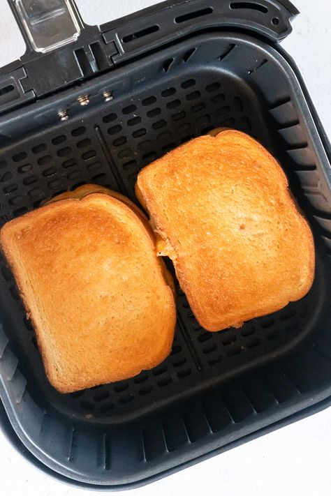 The BEST Air Fryer Grilled Cheese Sandwich Recipe! This easy grilled cheese is extra cheesy, super crispy and so delicious! One of our favorite air fryer recipes for an easy comfort food meal! Air Fryer Grilled Cheese, Easy Grilled Cheese, Making Grilled Cheese, Cheese Sandwich Recipes, Best Grilled Cheese, Best Air Fryers, Air Fryer Dinner Recipes, Easy Comfort Food, Air Fryer Recipes Easy