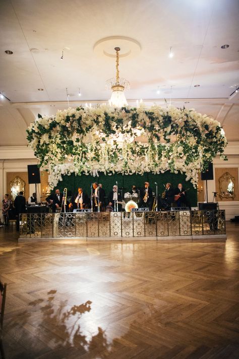 Flower and greenery wreath floral installation ceiling wedding reception over dance floor Wreath Photography, Floral Chandeliers, Floor Dance, Wedding Ceiling Decorations, Wedding Surprise, Reception Tent, Hanging Wedding Decorations, Wedding Ceiling, Flowers Hanging