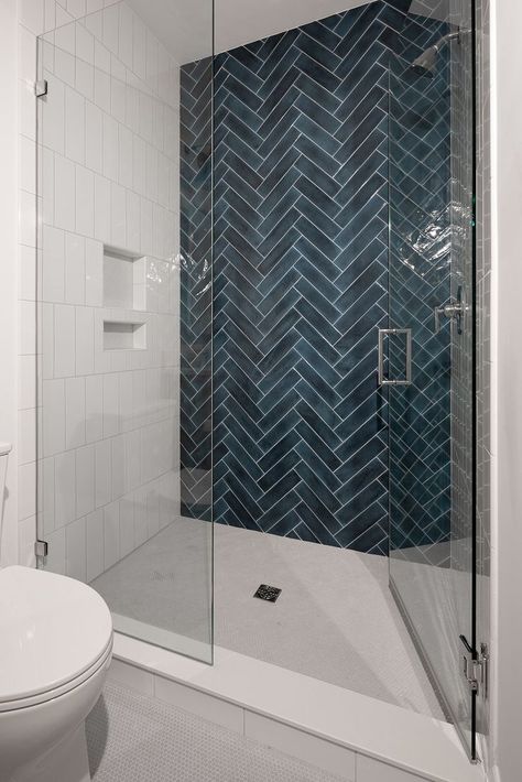 Blue Herringbone Tile Bathroom, Tiled Accent Wall, Blue Herringbone Tile, Herringbone Tile Bathroom, White Shower Tile, Blue Shower Tile, Tile Walk In Shower, Tile Accent Wall, Blue Bathroom Tile