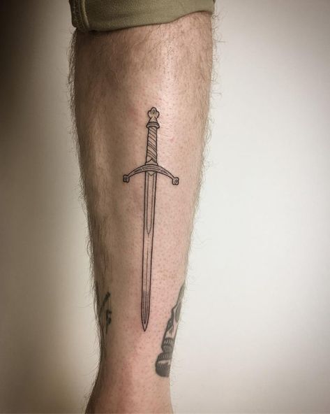 Two-handed broad sword tattoo by Kirk Budden - Tattoogrid.net Red Lotus Tattoo, Bible Tattoos, Shin Tattoo, Engraving Tattoo, Christian Sleeve Tattoo, Leg Tattoo Men, Dagger Tattoo, Classic Tattoo, Small Tattoos For Guys