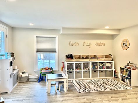 White And Wood Playroom, Playroom Rec Room Combo, Workout And Playroom Combo, Open Loft Playroom Ideas Upstairs, Basement Playroom And Tv Room, Simple Basement Playroom, Workout Playroom Combo, Open Concept Playroom, Home Gym And Playroom Combo