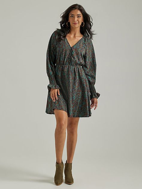 PERFECT WESTERN CHARM Few styles are quite as flattering as this fit and flare silhouette. The Wrangler long-sleeve button front dress offers a fitted style through the hips and then releases to a flared, A-line skirt that ends just above the knee. This flattering dress features a v-neck, a deep chevron sketch print, and with its smocked cuff poet sleeves, this dress makes a perfect year-round style staple. Denim Midi Dress, Flattering Dress, Button Front Dress, Fitted Style, Antique Buttons, Flattering Dresses, Work Wear Women, Dress Clothes For Women, Dress With Boots