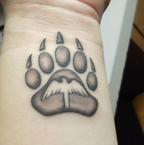 15+ Best Bear Claw Tattoo Ideas | PetPress Paw Print Tattoos, Bear Claw Tattoo, Bear Paw Tattoos, Claw Tattoo, Shoulder Cap Tattoo, Bear Paw Print, Pawprint Tattoo, Bear Tattoos, Paw Tattoo