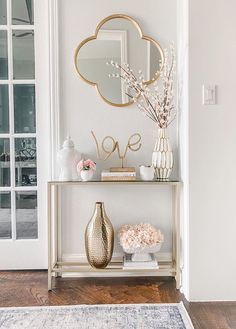 Glam Vignette Entryway table with gold vase via @shannongolddesign White And Gold Console Table Decor, Narrow Console Table Bedroom, Pink White And Gold Home Decor, Hallway Vase Decor, Glass Foyer Table, Console Table Decorating Gold, Gold And White Console Table, Home Gold Decor, White And Gold Bedroom Aesthetic Modern