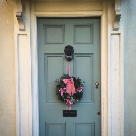 Fun vintage Christmas wreath on Oval Room Blue front door #farrowandball Oval Room Blue Front Door, Light Brick Exterior, Farrow And Ball Lulworth Blue, Interior Front Door Colors, Lulworth Blue, Front Door Color, Door Colour, Oval Room Blue, Front Door Styles