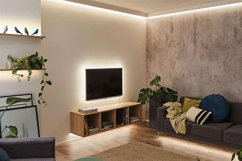 46 genius hacks for LED strip lights | loveproperty.com Led Lights Living Room Ideas, Led Lights Strip Ideas, Lights Behind Tv, Apartment Lighting, Tv Lighting, Hidden Lighting, Led Lighting Diy, Deco Led, Led Lighting Bedroom