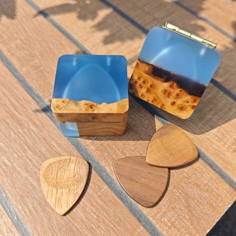 Wood and Resin Guitar Pick Box (Not with picks), Each box is one and only. The most best aesthetic difference on earth. #guitarpickbox #guitarpickholder #resinart #resincraft Resin Guitar Pick, Resin Guitar, Guitar Pick Box, Best Aesthetic, Wood And Resin, Guitar Pick, Resin Crafts, One And Only, Resin Art