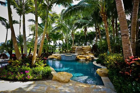 Tropical pool and greenery around it allow you to enjoy a luxurious staycation [Design: Tony Grimaldi Landscape Architecture] Tropical Pool Landscaping, Pool Landscape, Tropical Backyard, Pool Landscape Design, Tropical Pool, Natural Swimming Pools, Backyard Pool Landscaping, Backyard Paradise, Ideas Backyard