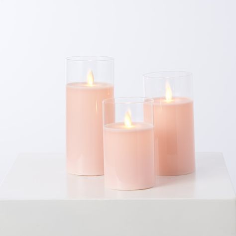 Features: Set of 3 5" H x 3" W 6" H x 3" W 7" H x 3" W Wax + Glass Moving Flickering Flame AAA Battery Operated Batteries Sold Separately 4 hour timer Remote Included Indoor Use Imported Experience the aesthetic of a flickering candle in any environment with our Moving Flameless LED Glass & Light Pink Pillar Candles with Remote. This set of three provide a high-quality, authentic wax look with a subtle flame effect. Flameless Candles Wedding, Pink Pillar Candles, Pillar Candle Centerpieces, Color Durazno, Flickering Candle, Flameless Candle Set, Cylinder Candles, Reception Tables, Flameless Led Candles