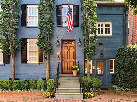 Learn some American flag facts and the best way to display your flag at home #curbappeal #Americanflag Door Colors For Blue House, Blue Brick House Exterior, Brick Exteriors, Dark Blue Houses, Georgetown Dc, Best Front Door Colors, Brick Homes, Best Front Doors, Painted Brick House