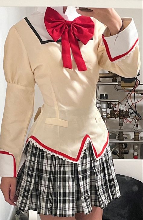 A mirror picture of a body with a school uniform on, a yellow blouse with puffy sleeves and red and white detailing and a big red bow at the neck, and a white and black checkered skirt Madoka Inspired Outfit, Madoka Magica Uniform, Madoka Magica Cosplay, Madoka Cosplay, Mao Isara, Cosplay Sewing, Cool Cosplay, Cosplay Reference, Question Marks