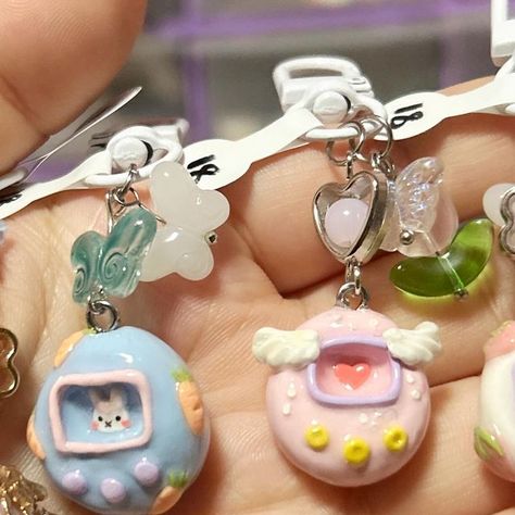 angel | kawaii clay art (´,,•ω•,,)♡ on Instagram: "tamagotchisssssssssssssss  . . #polymerclay #clayartist #kawaiicharms #cutecharms #cuteclay #claycharms #kawaii #cute #art #artist #sanrio #sanriocharms #cinnamoroll #usahana #badtzmaru #kuromi #mymelody #pompompurin" Polymer Clay Sanrio, Kuromi Clay Art, Clay Kuromi, Kuromi Clay, Clay Cute Ideas, Sanrio Clay, Kawaii Clay, Clay Craft, Cute Polymer Clay