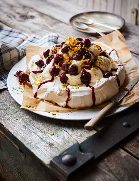 A fruity pavlova perfect for using in-season cherries. Serve this meringue pudding for a dessert this summer Fruit Pavlova, Roasted Plums, Balsamic Cherries, Cherry Party, Bakewell Tart, Pavlova Recipe, Small Food Processor, Fresh Figs, British Food