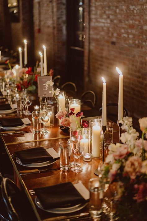 Julia and Andrew's reception tables are adorned with romantic flowers and candles for their wedding at The Wythe Hotel in Brooklyn, NY. Candle Reception Decor, Dear September, Wedding Dinner Table Setting, Moody Tablescape, Candles Reception, September Events, Candle Table Centerpieces, Flowers And Candles, Wythe Hotel