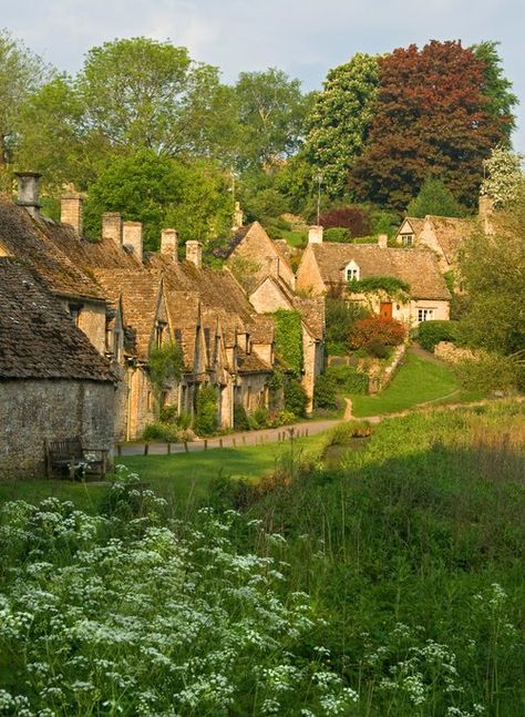 Wouldn't you love to be waking up on Awkward Hill in the village of Bibury in the Cotswolds this morning? I can't think of any place I'd ... Gloucestershire England, Arlington Row, English Village, English Countryside, England Travel, Pretty Places, The Village, Travel Dreams, Beautiful World