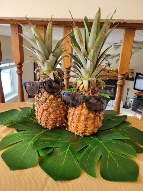 Sunglasses on Pineapples for Centerpieces Hawaiian Birthday Party For Men, 5 Oclock Somewhere Party, Bahamas Party Theme, Luau Party Table Decorations, Bahamas Theme Party, Hawaiian Retirement Party Ideas, Tropical Graduation Party Ideas, Luau Graduation Party Ideas, Tropical Theme Party Decorations