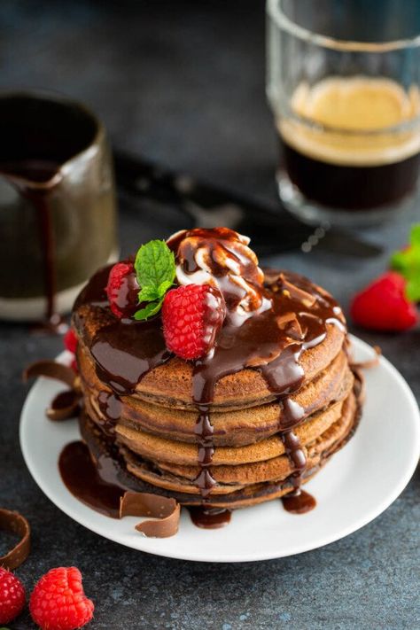 Triple Chocolate Pancakes! Fluffy chocolate pancakes are stuffed with chocolate chips and served with a homemade rich chocolate sauce on top! #Chocolate #ChocolatePancakes #Pancakes #Breakfast #PancakeRecipe #ChocolateRecipes #ChocolateChipPancakes Chocolate Punch, Stuffed Pancakes, Chocolate Pancake, The Novice Chef, Chocolate Ganache Glaze, Homemade Chocolate Sauce, Novice Chef, Best Pancake Recipe, Chocolate Pancakes