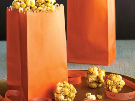 Bite-size Honey Popcorn Balls | Bite-size Honey Popcorn Balls Low Cal Appetizers, Orange Popcorn, Halloween Candy Recipes, Popcorn Balls Recipe, Honey Popcorn, Halloween Party Treats, Healthy Halloween Treats, Popcorn Treats, Popcorn Balls